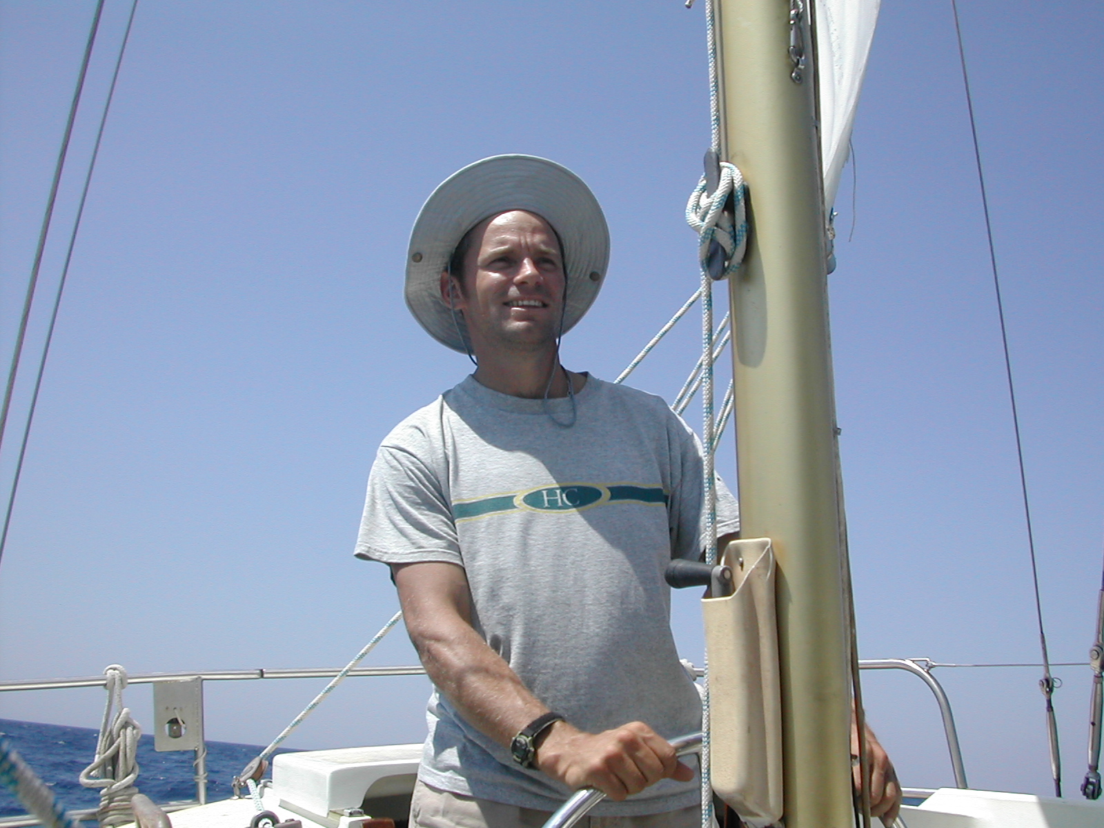 Aram DiGennaro at the helm aboard Sailing Acts, Aegean Sea, 2004