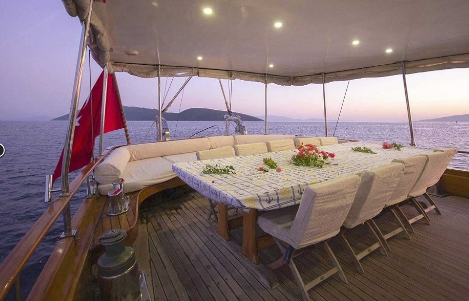 Dinner on deck at anchorage, dusk