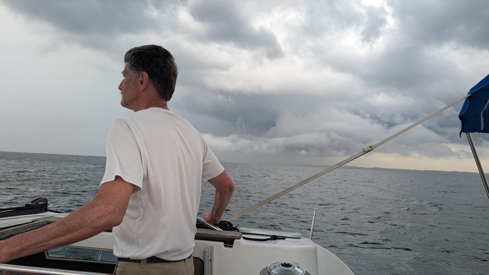 At the helm, reading the weather